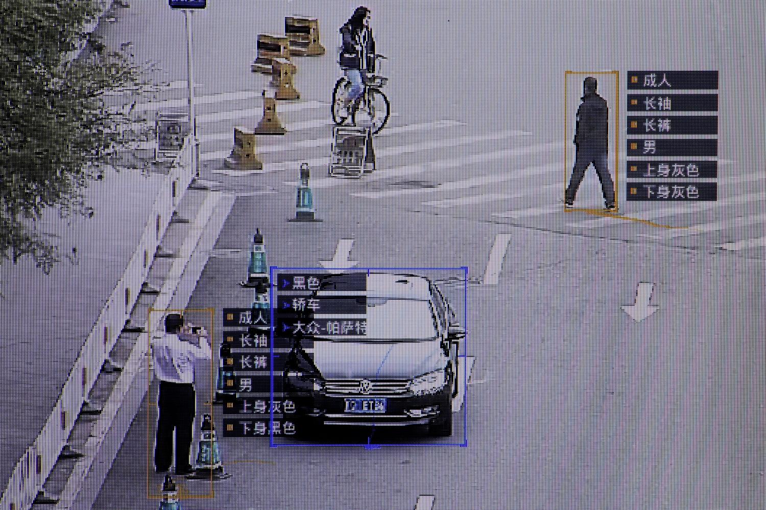 FILE PHOTO: SenseTime surveillance software, which identifies details about people and vehicles, runs during a demonstration at the company's office in Beijing, China, October 11, 2017. REUTERS/Thomas Peter/File Photo