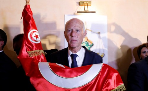 FILE PHOTO: Tunisian then-presidential candidate Kais Saied reacts after exit poll results were announced in a second round runoff of the presidential election in Tunis, Tunisia October 13, 2019. REUTERS/Zoubeir Souissi//File Photo