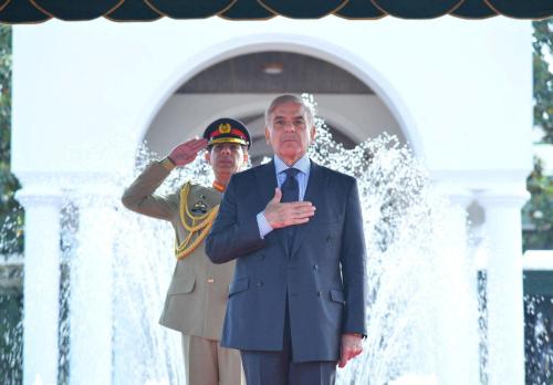 Pakistan's Prime Minister Shehbaz Sharif gestures during the guard of honour ceremony at the Prime Minister house in Islamabad, Pakistan April 12, 2022. Press Information Department (PID) Handout via REUTERS/ATTENTION EDITORS - THIS PICTURE WAS PROVIDED BY A THIRD PARTY.