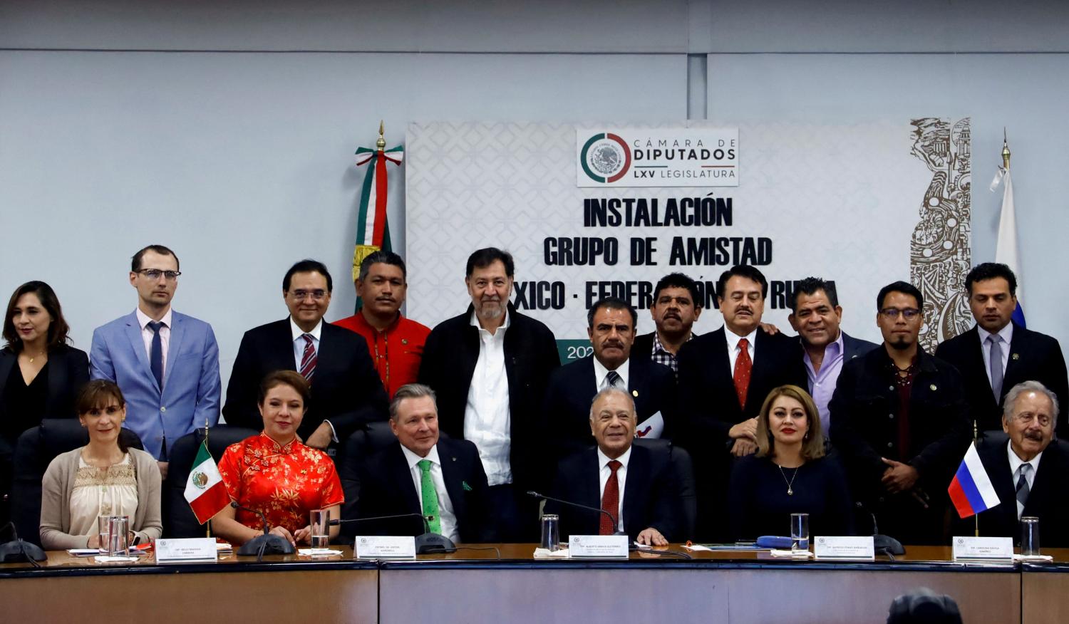 Mexico's Congresspeople pose with Russia's ambassador in Mexico Viktor Koronelli as they participate in the installation of the Friendship Group "Mexico-Russian Federation", at the San Lazaro legislative palace, in Mexico City, Mexico March 23, 2022. REUTERS/Luis Barron