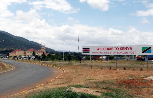A signage is seen at the border crossing point between Kenya and Tanzania in Namanga, Tanzania July 19, 2019. Picture taken July 19, 2019. REUTERS/Njeri Mwangi