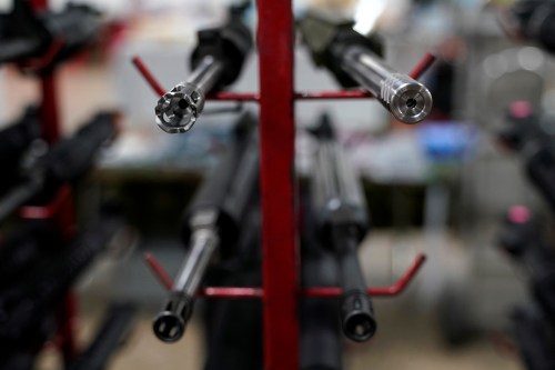 The barrels of AR-15 rifles are displayed for sale at the Guntoberfest gun show in Oaks, Pennsylvania, U.S., October 6, 2017.   REUTERS/Joshua Roberts