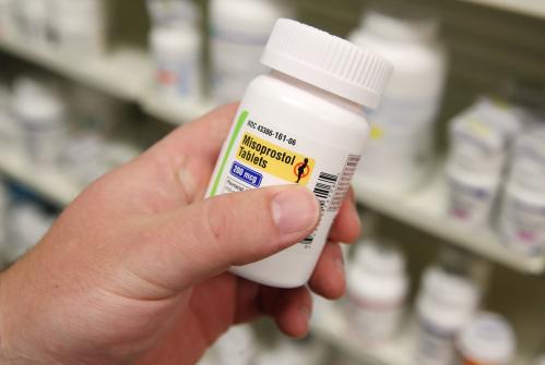 A pharmacist shows a bottle of the drug Misoprostol, made by Lupin Pharmaceuticals, at a pharmacy in Provo, Utah, U.S., June 19, 2019. Picture taken June 19, 2019.  REUTERS/George Frey