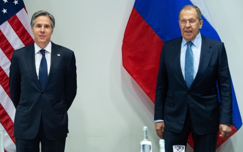 U.S. Secretary of State Antony Blinken poses with Russian Foreign Minister Sergey Lavrov as they arrive for a meeting at the Harpa Concert Hall, on the sidelines of the Arctic Council Ministerial summit, in Reykjavik, Iceland, May 19, 2021. Saul Loeb/Pool via REUTERS