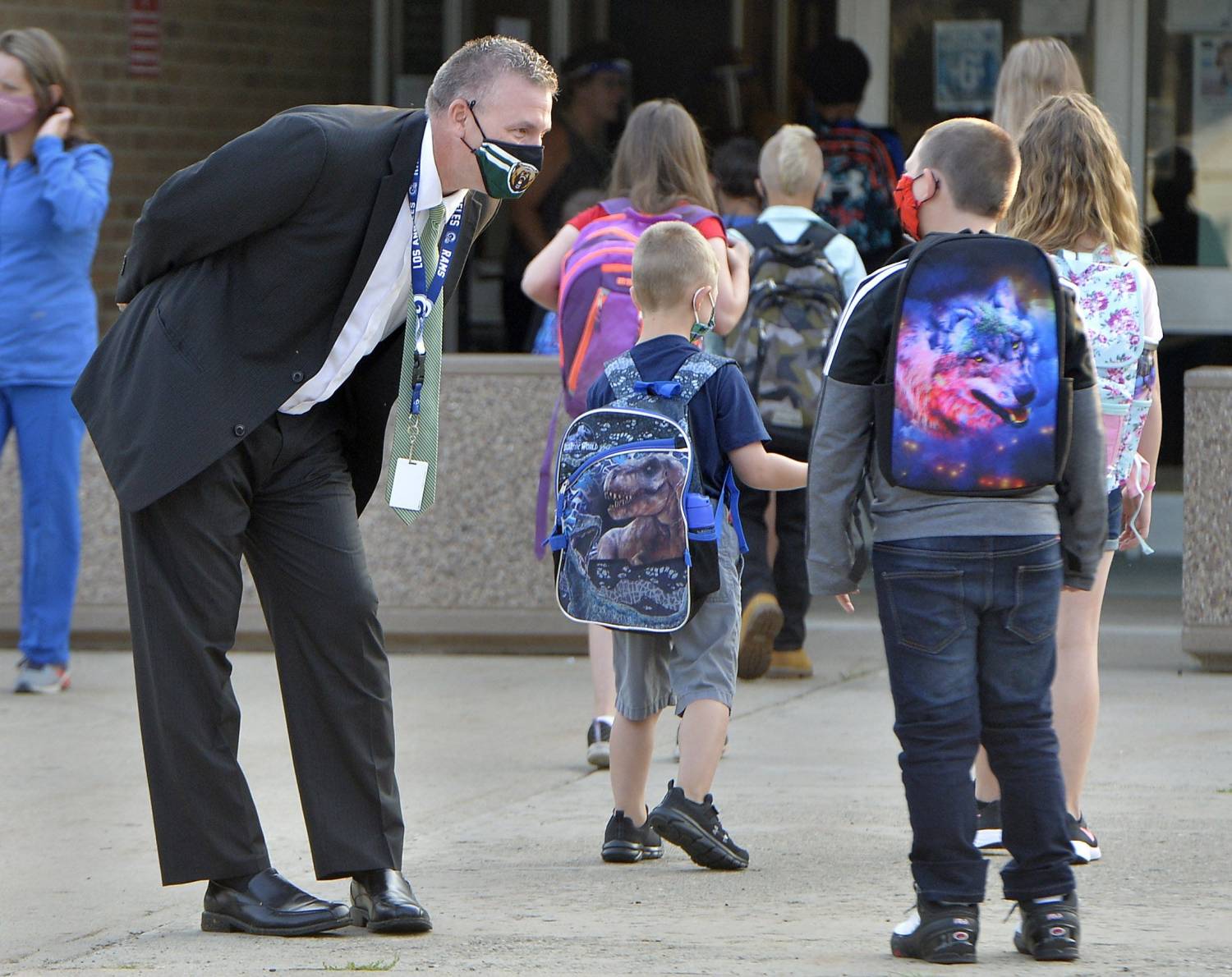 Union City Area School District Superintendent Matt Bennett, left, greets Union City Area Elementary School students on August 25, 2020, the first day of school, in Union City. Staff, students and parents are adjusting to a new routine due to the COVID-19 coronavirus pandemic.P2backtoschool082520