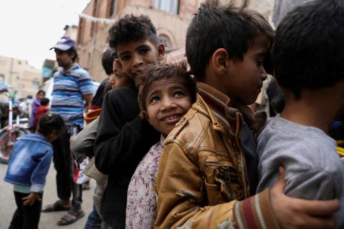 Boys stand in line as they wait to receive meals from a charity kitchen during the holy month of Ramadan in Sanaa, Yemen April 18, 2022. Picture taken April 18, 2022. REUTERS/Khaled Abdullah     TPX IMAGES OF THE DAY