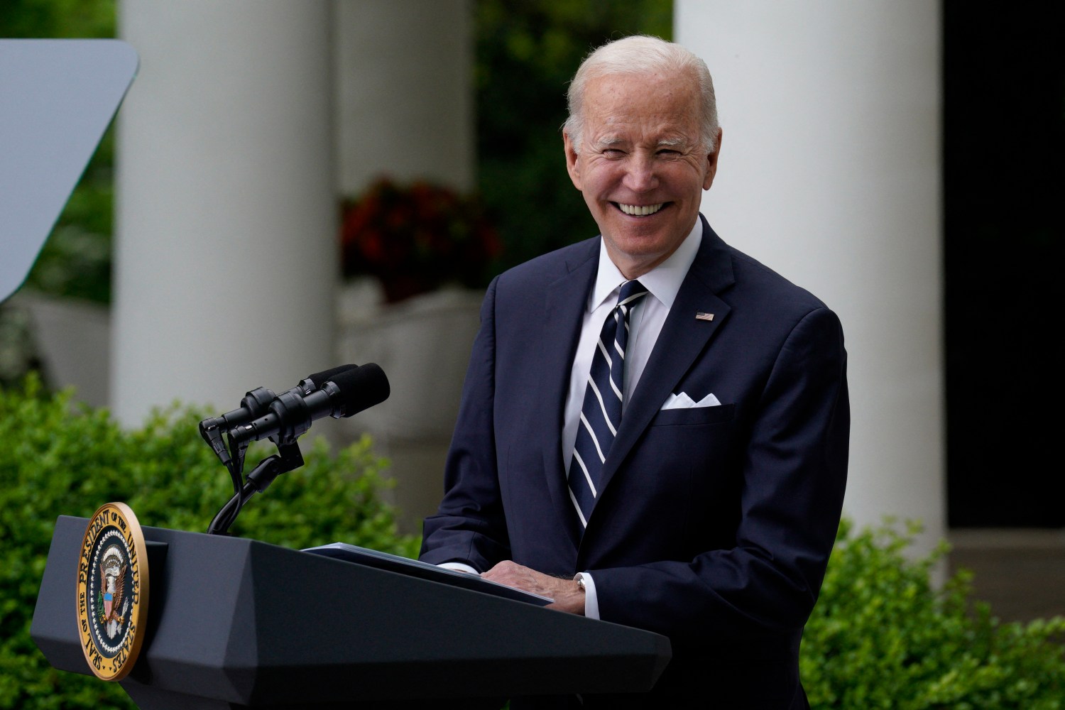 U.S. President Joe Biden smiles