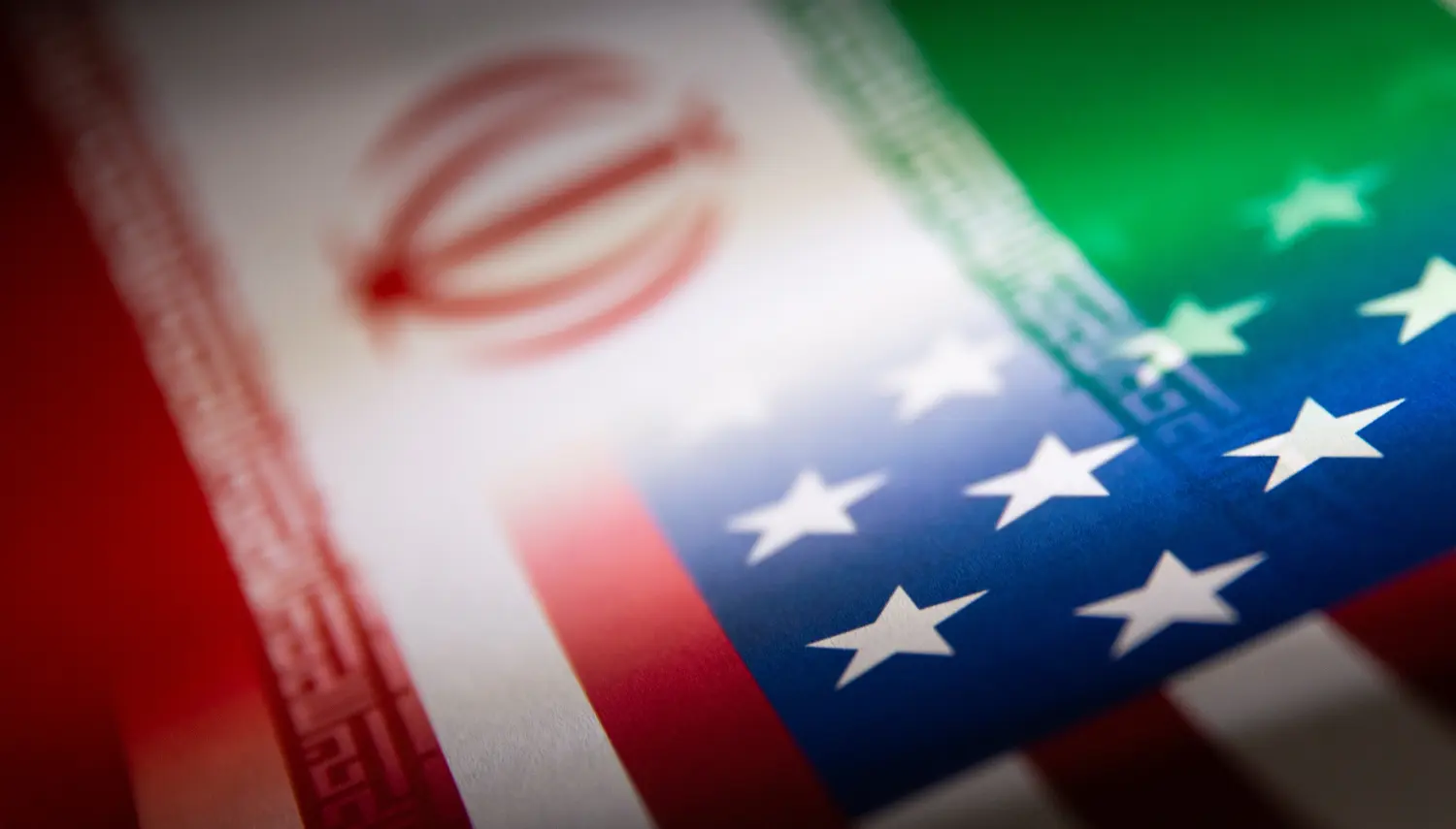 Iran's and U.S.' flags are seen printed on paper in this illustration taken January 27, 2022. REUTERS/Dado Ruvic/Illustration