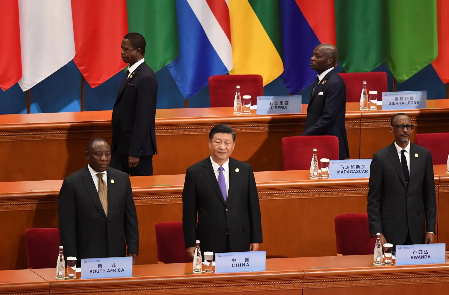 China's President Xi Jinping, front center, stands as participants arrive for the opening ceremony of the Forum on China-Africa Cooperation at the Great Hall of the People in Beijing September 3, 2018. Madoka Ikegami/POOL Via REUTERS