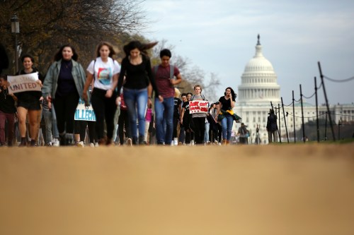 Students march along the National Mall during a protest against President-elect Donald Trump in Washington, U.S., November 15, 2016. REUTERS/Carlos Barria     TPX IMAGES OF THE DAY