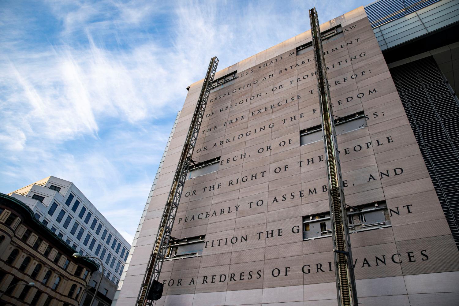 A wall stating the First Amendment of the U.S. Constitution is seen on the recently closed Newseum, in Washington, U.S., February 21, 2021. REUTERS/Al Drago