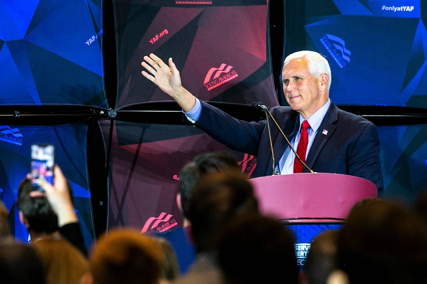 Former Vice President Mike Pence waves as he is introduced during a Young America's Foundation event, "How to Save America from the Woke Left," Monday, Nov. 1, 2021, at the Iowa Memorial Union on the University of Iowa campus in Iowa City, Iowa.211101 Pence Iowa 007 Jpg
