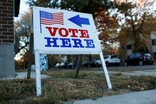 People cast their ballots as voters decide on whether to abolish the police department and replace it with a new department of public safety in the wake of George Floyd's murder in Minneapolis, Minnesota, U.S., November 2, 2021. REUTERS/Nicole Neri