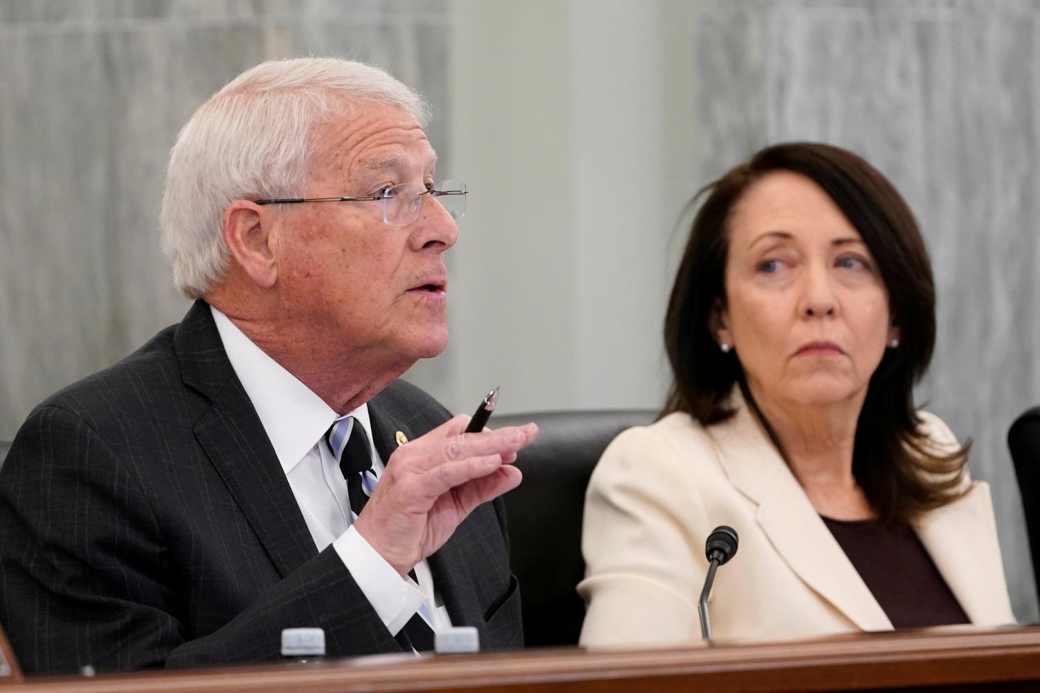 Senate Commerce, Science and Transportation Committee ranking member U.S. Senator Roger Wicker (R-MS) asks a question of Gigi Sohn, who is President Joe Biden's nominee to serve on the Federal Communications Commission, during her confirmation hearing before the Senate Commerce, Science and Transportation Committee, next to Senator Maria Cantwell (D-WA)