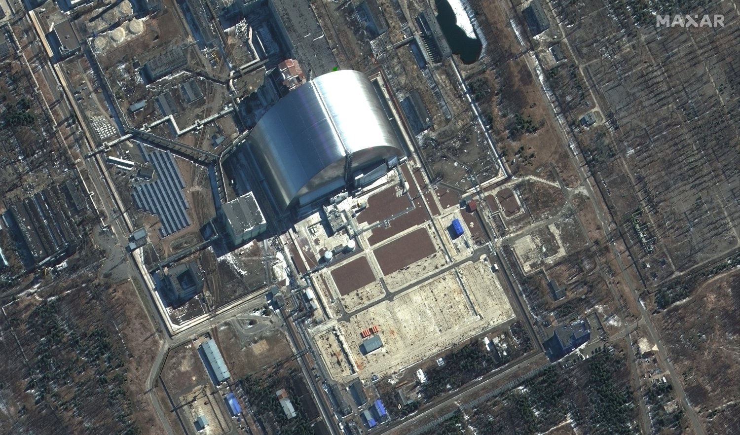 Latest satellite imagery released by private satellite company Maxar on Friday March 11, 2022 showing Russia-occupied Chernobyl nuclear plant in Pripyat, northern Ukraine.