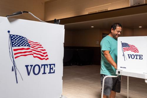 Esteban Meza, a longtime Salinas voter, stands in front of a voting booth ready to vote inside St. Mary of the Nativity Catholic Church  s hall during the 2022 California Primary elections in Salinas, Calif., on Tuesday, June 7, 2022.