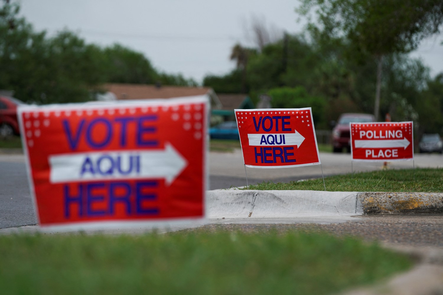 Voting signs are displayed outside a polling site during a special election to fill the vacant 34th congressional district seat in Los Fresnos, Texas, U.S.