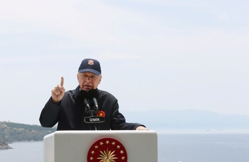 Turkish President Tayyip Erdogan addresses the audience as he watches a military exercise near Izmir, Turkey, June 9, 2022. Murat Cetinmuhurdar/PPO/Handout via REUTERS