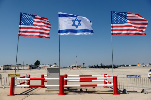 Israeli and American flags stand during the final rehearsal for the ceremony to welcome U.S. President Joe Biden ahead of his visit to Israel, at Ben Gurion International airport, in Lod near Tel Aviv, Israel July 12, 2022. REUTERS/Amir Cohen
