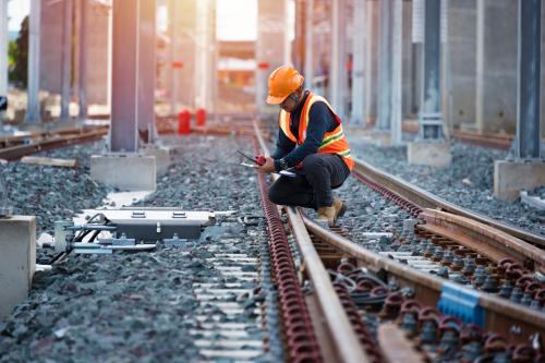 Engineer sitting on railway inspection