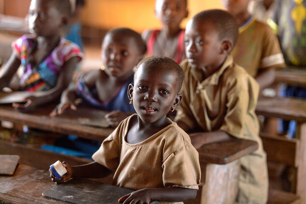 primary school student in Sierra Leone classroom