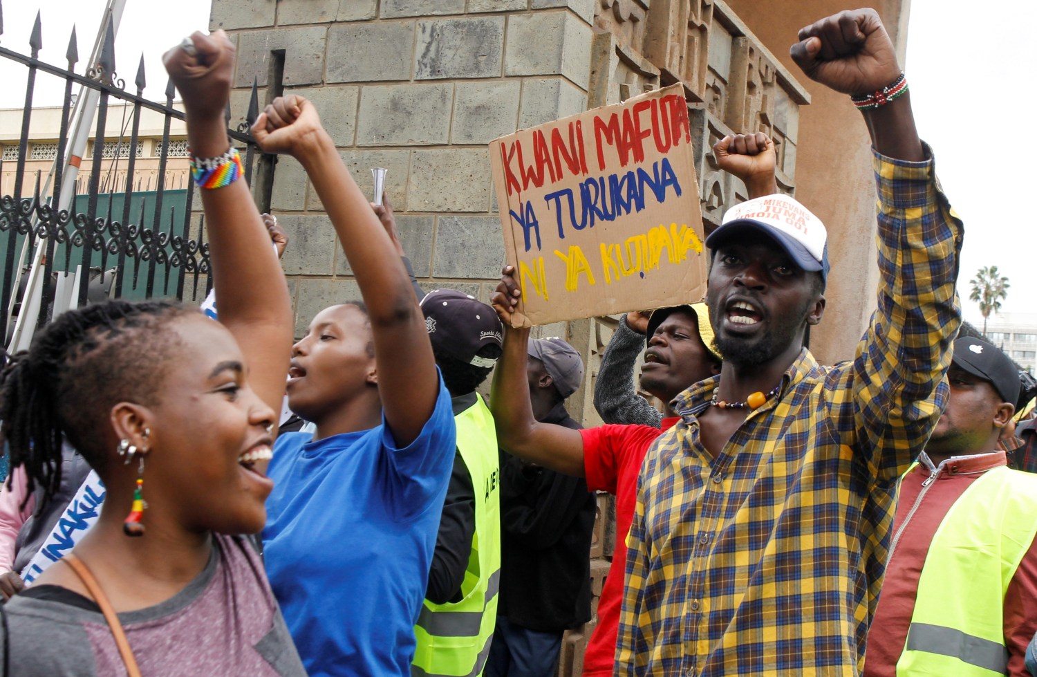 Activists from the social justice centres working group chant during a demonstration asking the government to lower costs of living, especially on food prices, in downtown Nairobi, Kenya May 17, 2022. REUTERS/Monicah Mwangi