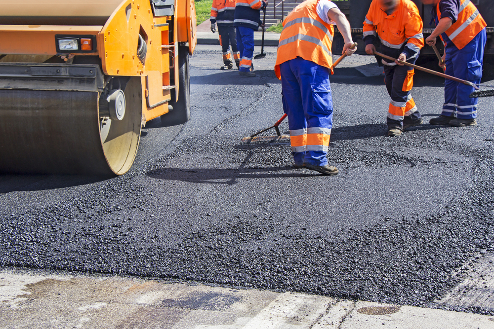 Roller,And,Workers,On,Asphalting,And,Repair,Of,City,Streets