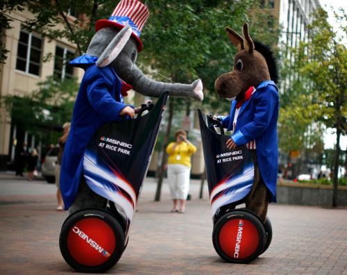Mascots representing the Republican party (L) and the Democratic party (R) ride around on Segway personal transporters at the 2008 Republican National Convention in St. Paul, Minnesota September 2, 2008. REUTERS/Jim Young (UNITED STATES) US PRESIDENTIAL ELECTION CAMPAIGN 2008 (USA)