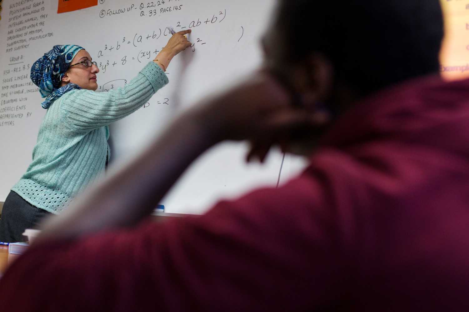 A Newark Prep Charter School student listens to math teacher Faiza Sheikh, give a lesson at the school in Newark, New Jersey April 16, 2013. REUTERS/Lucas Jackson (UNITED STATES - Tags: EDUCATION)