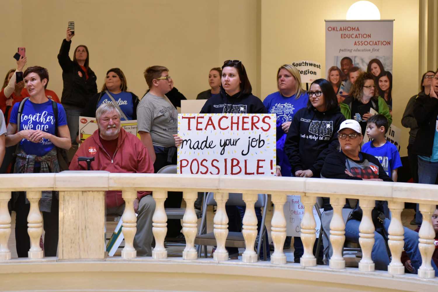 Teachers rally inside of the state Capitol rotunda on the second day of a teacher walkout to demand higher pay and more funding for education in Oklahoma City, Oklahoma, U.S., April 3, 2018.  REUTERS/Nick Oxford