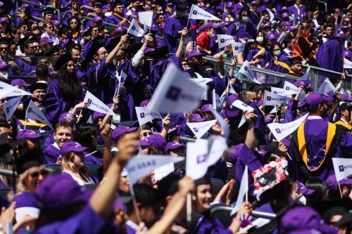 Graduating students attend the New York University (NYU) graduation ceremony at Yankee Stadium in the Bronx borough of New York City, New York, U.S., May 18, 2022. REUTERS/Shannon Stapleton