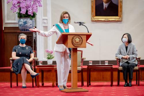 U.S. House of Representatives Speaker Nancy Pelosi speaks next to Taiwan President Tsai Ing-wen and American Institute in Taiwan (AIT) Director Sandra Oudkirk during a meeting at the presidential office in Taipei, Taiwan August 3, 2022. Taiwan Presidential Office/Handout via REUTERS  ATTENTION EDITORS - THIS IMAGE WAS PROVIDED BY A THIRD PARTY. NO RESALES. NO ARCHIVES.