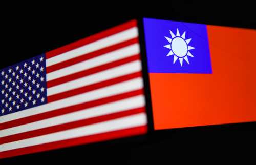 Flags of the United States and Taiwan displayed on phone screens are seen in this multiple exposure illustration photo taken in Poland on August 4, 2022. (Photo by Jakub Porzycki/NurPhoto)NO USE FRANCE