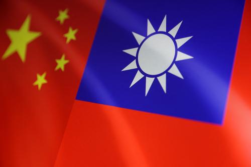 Chinese and Taiwanese flags are seen in this illustration, August 6, 2022. REUTERS/Dado Ruvic/Illustration