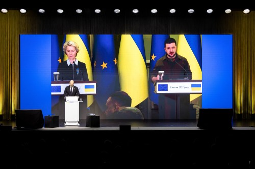 Ukrainian Prime Minister Denys Shmyhal speaks as a video of Ukrainian President Volodymyr Zelenskiy and European Commission President Ursula von der Leyen is displayed on a screen during the Ukraine Recovery Conference (URC2022), in Lugano, Switzerland, July 4, 2022. Michael Buholzer/Pool via REUTERS