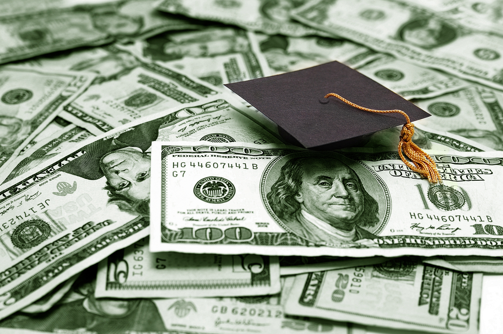 Small,Graduation,Cap,And,Money,--,Educational,Cost,Concept