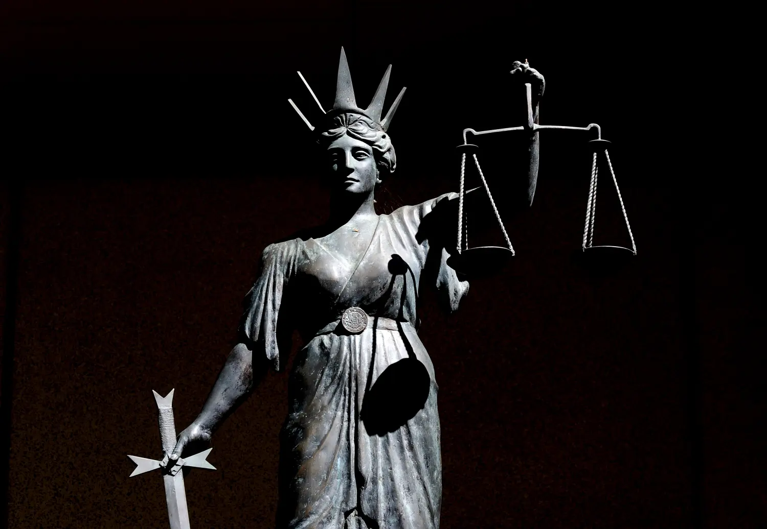 Stock picture of a statue of 'Lady Justice' or Themis, the Greek God of Justice, outside the Supreme Court in Brisbane, Tuesday, April 28, 2009. (AAP Image/Dave Hunt) NO ARCHIVINGNo Use Australia. No Use New Zealand.