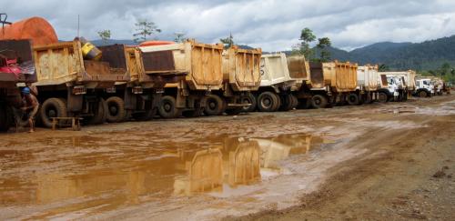 Trucks sit idle in a nickel-mining area in Indonesia's central Sulawesi July 8, 2012. Indonesia's nickel mining operations and exports have been mostly halted since the government restricted exports of unprocessed minerals in May, and levied a 20 percent export tax, the Indonesian Nickel Association (ANI) said on Wednesday. Picture taken July 8, 2012. To match Interview INDONESIA-NICKEL REUTERS/Fergus Jensen (INDONESIA - Tags: BUSINESS COMMODITIES TRANSPORT POLITICS)