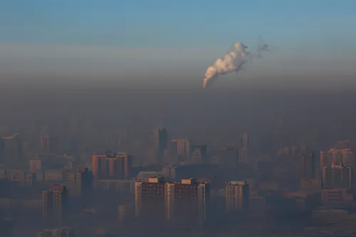 Emissions from a power plant chimney rise over Ulaanbaatar, Mongolia January 13, 2017.  REUTERS/B. Rentsendorj   SEARCH "RENTSENDORJ POLLUTION" FOR THIS STORY. SEARCH "WIDER IMAGE" FOR ALL STORIES.      TPX IMAGES OF THE DAY