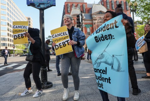 Activists demonstrate outside an entrance to the White House calling for the cancellation of student debt in Washington, U.S., April 27, 2022. REUTERS/Evelyn Hockstein