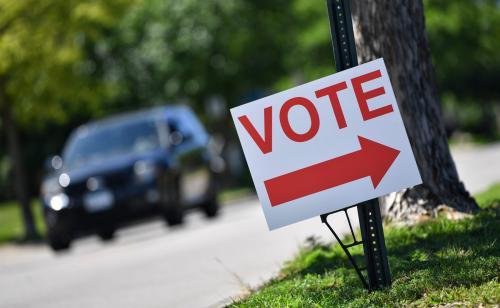 A sign directs voters to the St. Cloud City Hall polling place for primary elections Tuesday, Aug. 9, 2022, along Seventh Street South in St. Cloud.Primary Voting 1