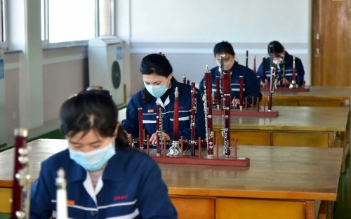 Pyongyang, North Korea - The photo, published on February 2, 2021, by the Choson Sinbo, a pro-North Korean newspaper based in Japan, shows North Korean workers working in a factory of indigenous musical instruments in Pyongyang. The United Nations is concerned about the continuing violation of human rights in North Korea, declared the UN High Commissioner for Human Rights (Acnudh), Michelle Bachelet.