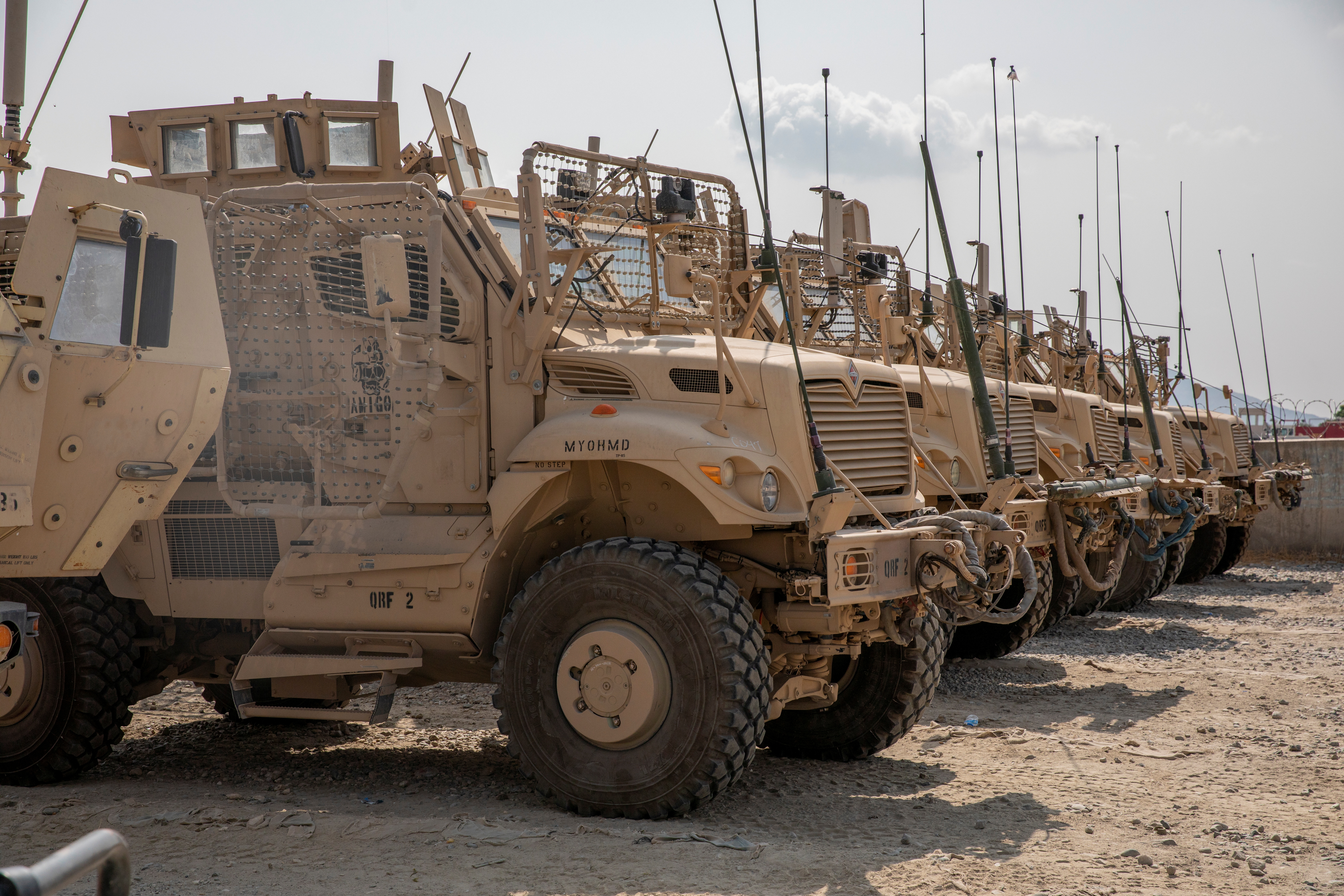U.S. Army soldiers from the 10th Mountain Division and U.S. contractors prepare Mine Resistant Ambush Protected vehicles, MRAPs, to be transported off of base in support of the withdrawal mission in Kandahar, Afghanistan, August 21, 2020. Picture taken August 21, 2020. U.S. Army/Sgt. Jeffery J. Harris/Handout via REUTERS THIS IMAGE HAS BEEN SUPPLIED BY A THIRD PARTY.