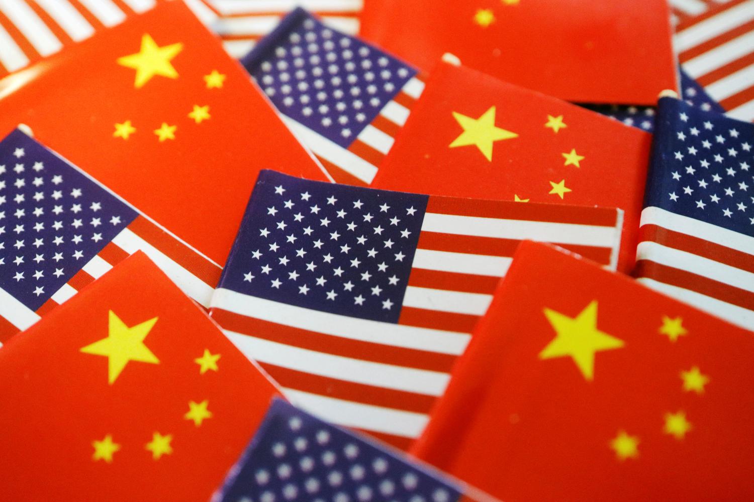 Flags of U.S. and China are seen in this illustration picture taken August 2, 2022. REUTERS/Florence Lo/Illustration