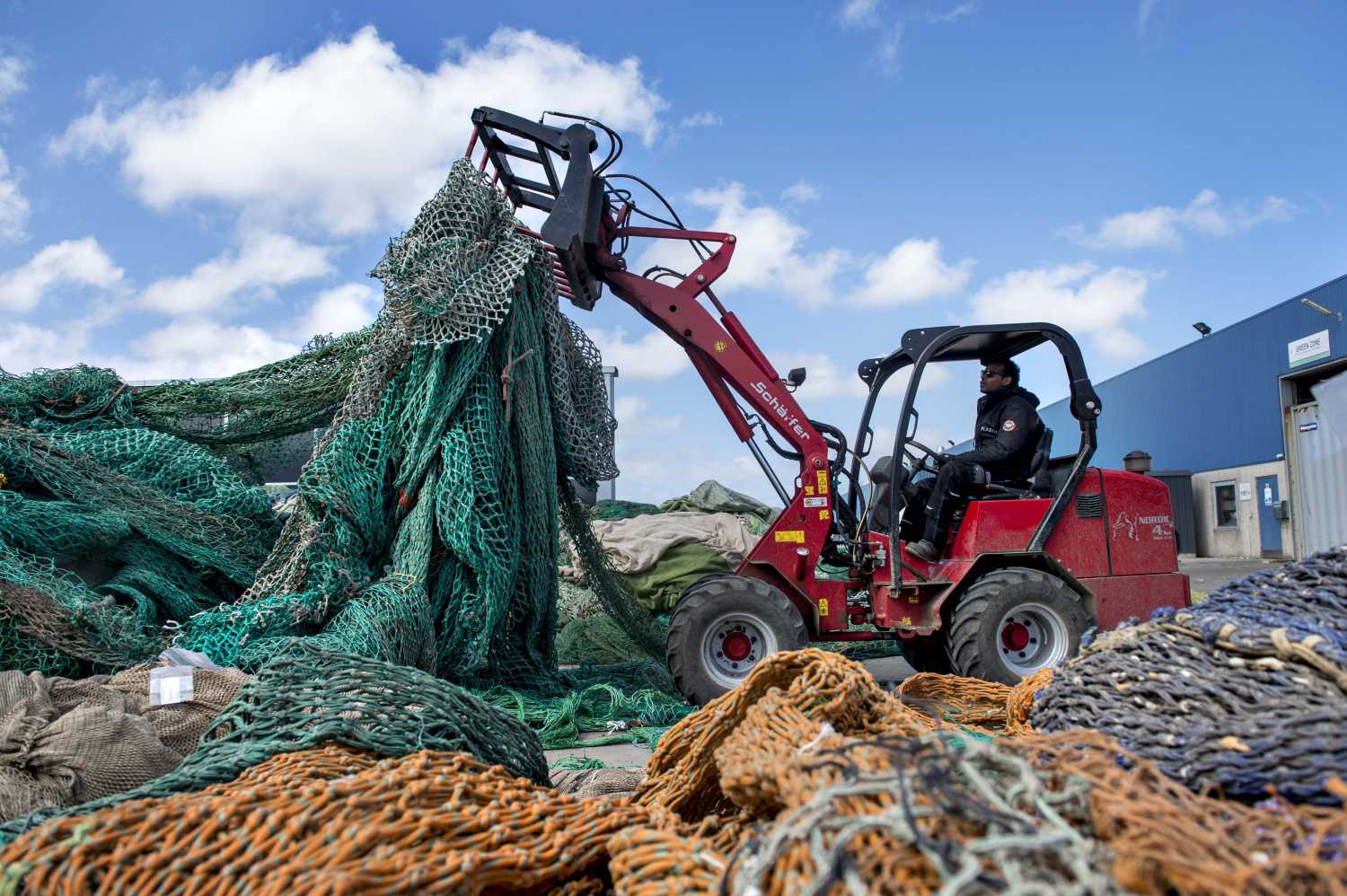 Your new BMW could make you feel like a fish out of water - as in the future parts will be made from recycled fishing nets.In a first for the automotive industry, from 2025 models of their NEUE KLASSE cars will feature trim parts made of plastic whose raw material contains around 30 percent recycled nets and ropes. This raw material is proactively sourced at ports all around the world to ensure that it doesn’t end up being discarded in the sea.In an exclusive recycling process, waste material from the maritime industry is used to produce trim parts suitable for the exterior and interior of future vehicles. The resulting components have an approximately 25 percent lower carbon footprint than their counterparts made from conventionally manufactured plastics.The BMW Group is working with different approaches to use plastic waste from the maritime industry as a raw material for vehicle components in order to conserve valuable resources and reduce CO2 emissions. This form of recycling makes it possible to reduce the need for petroleum-based primary plastics and at the same time counteract ocean pollution.Recycled nylon waste forms the basis for a synthetic yarn from which the floor mats in the BMW iX and the new BMW X1, for example, are made. This material, known as ECONYL, is made from discarded fishing nets well as worn floor coverings and residual waste from plastics production.In a new initiative developed in cooperation with the Danish company PLASTIX, the BMW Group is taking the recycling of maritime plastic waste a step further. After separation, fishing nets and ropes undergo an innovative process that produces plastic granules. While recycled maritime plastic has so far only been used in the automotive industry in the form of fibres for new vehicle components, this recycled material is now also suitable for the injection moulding process for the first time. The raw material for the components manufactured in this way can consist of around 30 percent mari