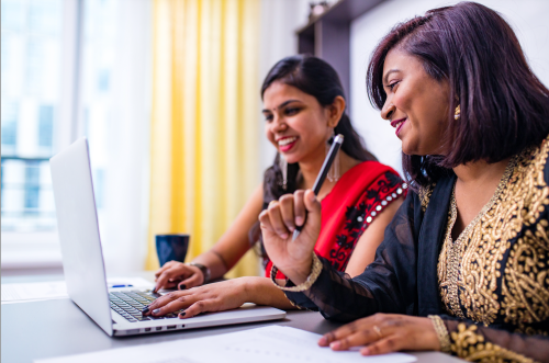 Two Indian women working