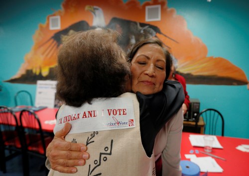U.S. Democratic Congressional candidate Deb Haaland, who is trying to become the first Native American woman in the U.S. House of Representatives, hugs Dottie Tiger at a Native Vote Celebration on midterm elections night in Albuquerque, New Mexico, U.S., November 6, 2018. REUTERS/Brian Snyder     TPX IMAGES OF THE DAY