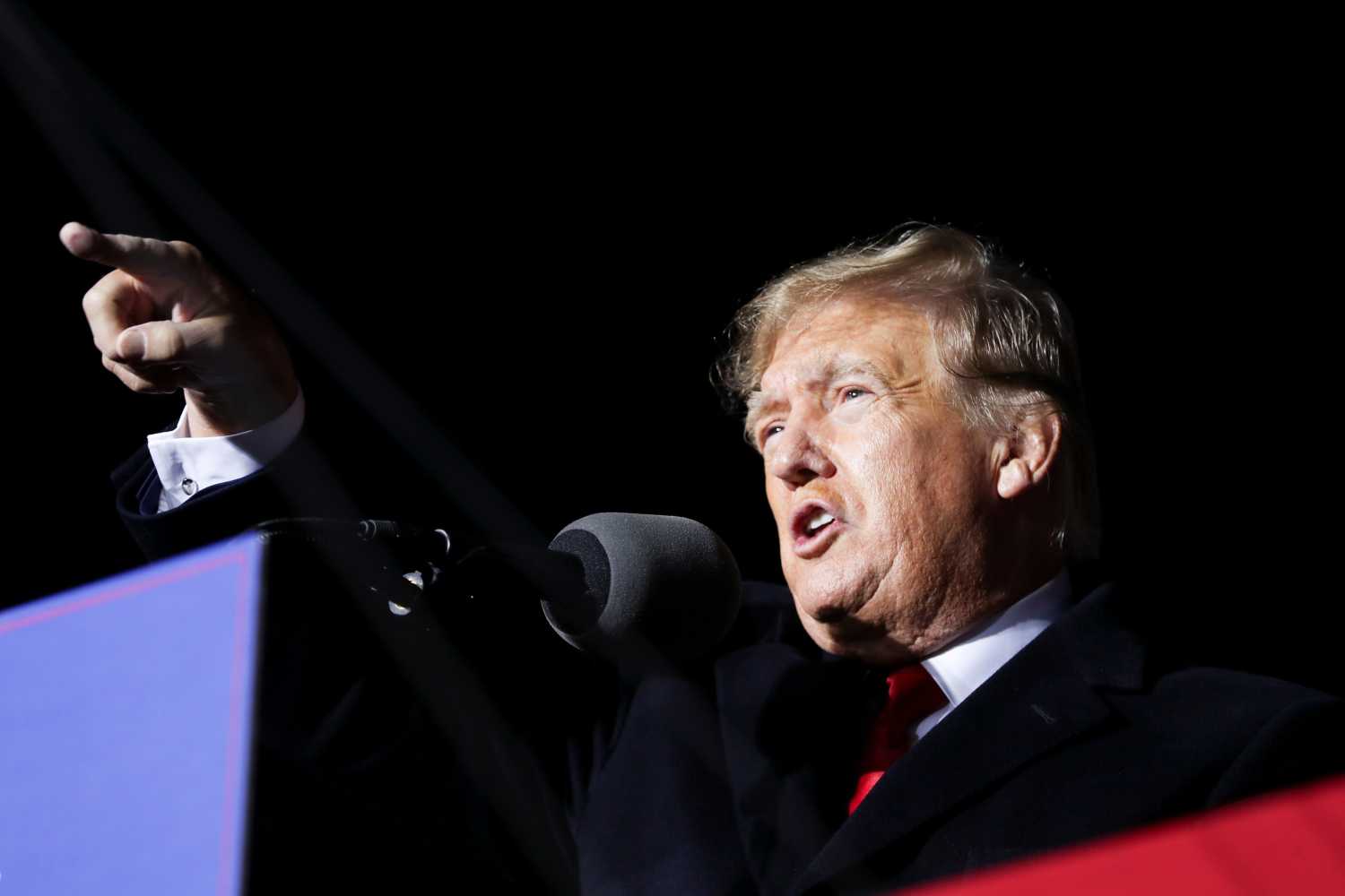 Former U.S. President Donald Trump speaks during a rally in Commerce, Georgia, U.S. March 26, 2022. REUTERS/Alyssa Pointer