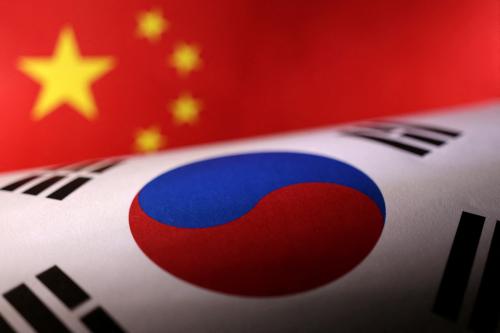 Printed Chinese and South Korean flags are seen in this illustration, July 21, 2022. REUTERS/Dado Ruvic/Illustration REFILE - CORRECTING YEAR