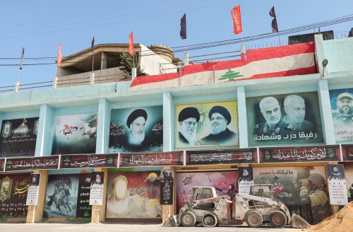A picture showing Lebanon's Hezbollah leader Sayyed Hassan Nasrallah and Iran's Supreme Leader Ayatollah Ali Khamenei is seen in the town of Yaroun, southern Lebanon, August 13, 2022. REUTERS/Aziz Taher